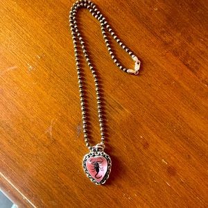 Good time silver scorpion necklace. Pink heart with real scorpion.